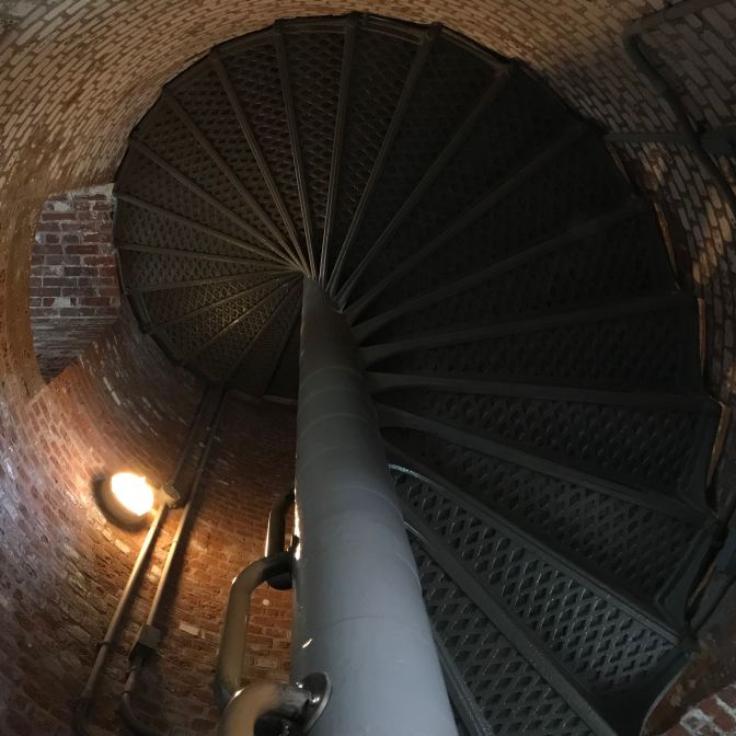 Upward view of stairs in the lighthouse.