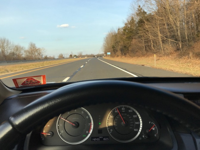 View of road behind dashboard of 2012 Honda Accord.