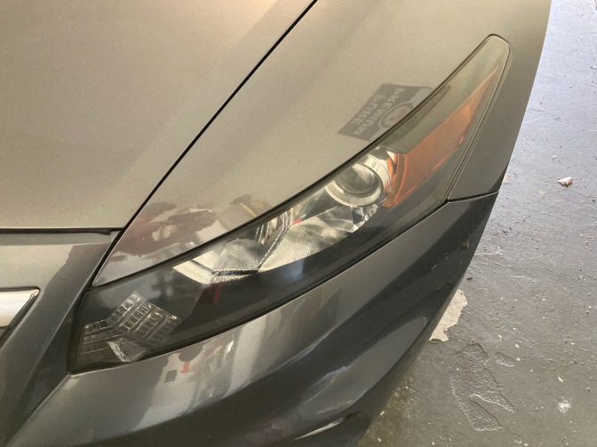 Front headlight of 2012 Honda Accord coupe.