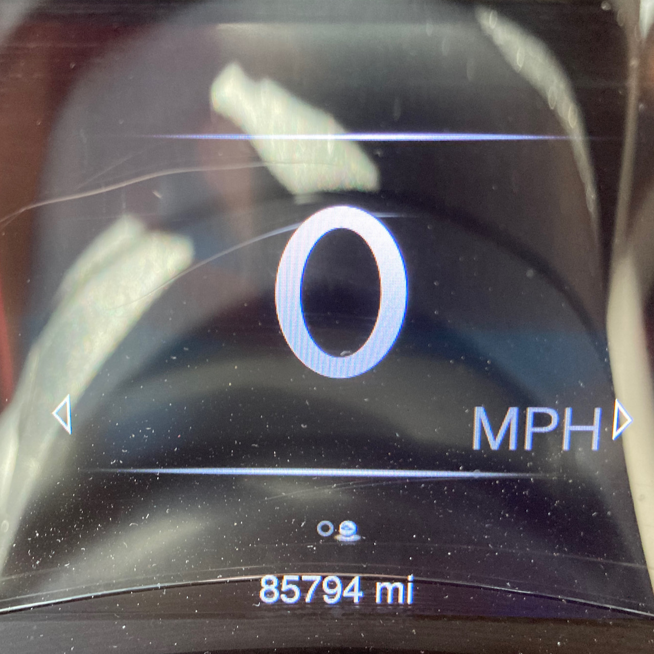 Car odometer reading 85794 miles.