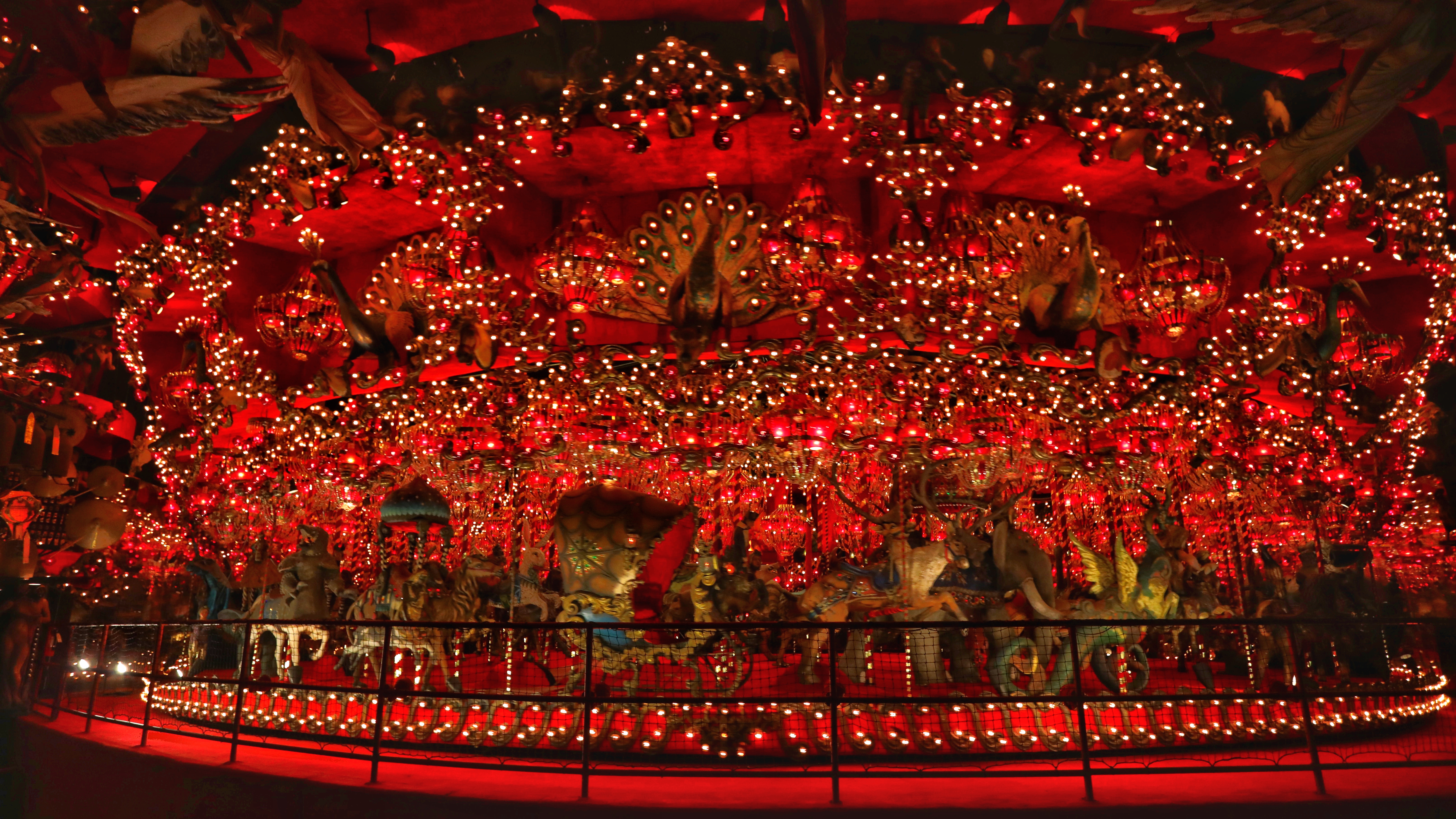 Carousel in red light.